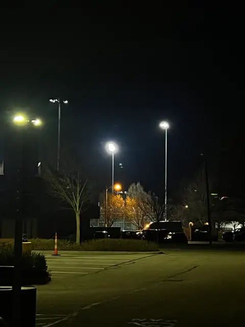 Urban solitude under the night lights.